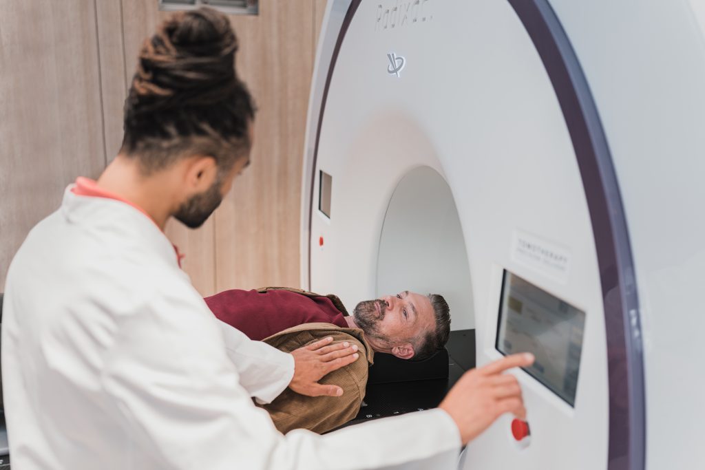 Technician making an exam on a patient - Healthcare in Italy fo expats